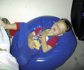 Nathan sleeping on bean-bag