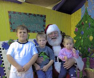 Daniel, Nathan, Santa Claus & Sianna, 21 Dec 99