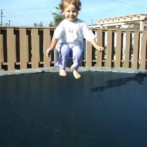 Sianna jumping on the trampoline - July 2001